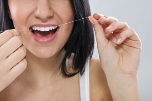 https://anooshafifidds.com/wp-content/uploads/2017/08/woman-flossing-gum-disease-300x200.jpg